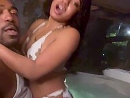 Curly-haired Fiji bitch got into the Jacuzzi with a black dude and slides her cunt on his dick for amateur video 10
