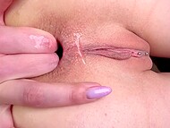 MILF with pierced pussy Lina Moore points fingers in her ass and enjoys amateur fingering in close-up