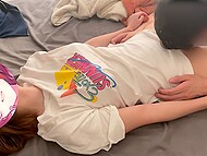 Young Asian chick in a T-shirt spreads her legs wider and gets cunnilingus, and then hot amateur fuck 5