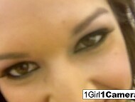 Uninhibited brunette gets naked for the camera and poses when playing with her slit at the sauna 7