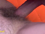 A mature woman enjoys intimate moments with a younger partner. 9