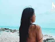 ModelMedia Asia presents a captivating scene of intense passion and desire unfolding on a secluded beach. 7