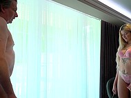 Blonde teen enjoys a steamy encounter with an older man in a hotel room. 6