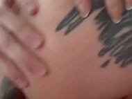 Inked whore with pierced tongue blows fat phallus and rides it with her shaved cunt 9