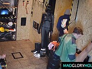 Horny MILF gets her eager throat and twat fucked by several men through the gloryhole 11