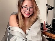 Cute Indonesian stepsister with glasses smiles when stroking and titfucking brother's big dick 5