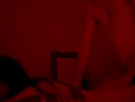 Diddy Kitty's steamy lovemaking in the crimson hues offers a sultry climax 7