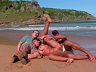 Lewd brunette takes pricks into her every hole on sea shore 4