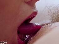 Lilly Bell in black lingerie licks and rubs pussy of her GF for the third lezzie to wach 6