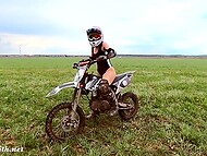 Bare Russian tart Jeny Smith whizzes by on a dirt bike 7