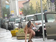 Amateur flasher Jeny Smith gets wet and even strips naked in the rain on the street