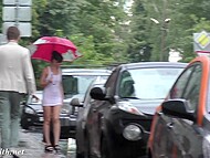 Amateur flasher Jeny Smith gets wet and even strips naked in the rain on the street 11