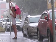 Amateur flasher Jeny Smith gets wet and even strips naked in the rain on the street 5