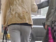 Amateur flasher Jeny Smith gets wet and even strips naked in the rain on the street 7