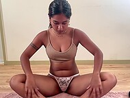 Slim Desi hottie MiaZ12 flexes in a sexy stretch while pleasing herself on the floor 9