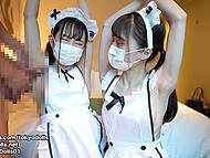 Japanese cosplay lasses in frilly aprons delight a lucky man with a double handjob 6