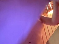 Attractive young shemale Eva Peaches rubs her big cock in the sauna until she cums hard 11