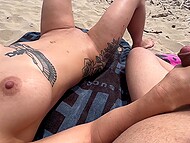 Mia Alexis Queen basks in the sun, her hands stroke her BF's thick manhood on a public beach 9