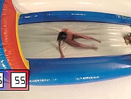 Three nude oiled-up lesbians get to the dry pool to masturbate with a huge dildo 6