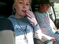 Lecherous blonde girlfriend stokes and sucks her man in the car on a public road 10