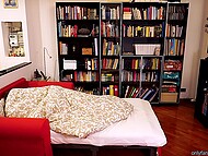 ElivaLove's hairy pussy receives a passionate cumshot during a love cuddle in bed 5