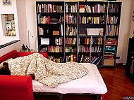 ElivaLove's hairy pussy receives a passionate cumshot during a love cuddle in bed 6