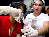 Dominating Asian nurse Salome Salvi and her girlfriend give a blowjob and sounding to an unlucky slave 10