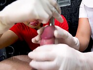 Dominating Asian nurse Salome Salvi and her girlfriend give a blowjob and sounding to an unlucky slave 9