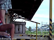 Provocative brunette takes cocks in mouth and vagina to be carnal with two men at the railway station 5