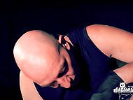 Bald girl with flexible waist is shackled and can't resist the hefty man teasing her 7
