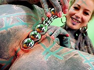 Totally tattooed guy gives the girl a cock ride after she masturbates and sucks his thick penis 7