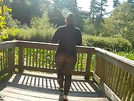 Chubby brunette in sheer leggings keeps flashing her big booty while walking in the secluded park 10