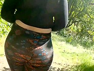 Chubby brunette in sheer leggings keeps flashing her big booty while walking in the secluded park 5