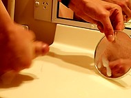 Man needs a small mirror not to look at himself but to ejaculate on it after jerking off 11