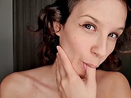 Brazilian girl languidly talks in Portuguese on camera and shows off her tits close-up 11