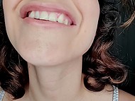 Brazilian girl languidly talks in Portuguese on camera and shows off her tits close-up 6