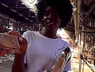 For cash curly-haired Ebony hooker strips naked and gets nailed by German guy in abandoned building 4