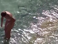 Woman and her man come to sunbathe on the beach and decide to make love 5