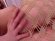 Horny MILF in pantyhose caresses her shaved pussy, pointing playful fingers into tight vagina 7