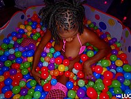 Man watches black guest shaking booty in colorful balls and goes to her for fucking 5