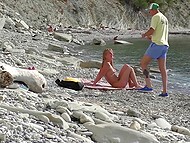 On the Bulgarian beach, tourist finds naked chick and convinces her to give him a quick blowjob 10