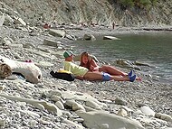 On the Bulgarian beach, tourist finds naked chick and convinces her to give him a quick blowjob 6