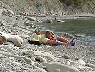 On the Bulgarian beach, tourist finds naked chick and convinces her to give him a quick blowjob 8