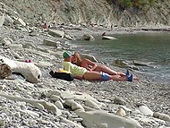 On the Bulgarian beach, tourist finds naked chick and convinces her to give him a quick blowjob 9