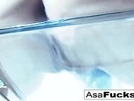 Uninhibited Asian sweetie Asa Akira takes off sexy lingerie and makes herself cum fingering her twat and ass 7