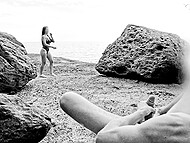 Lucky dude GentlyPerv watches two naked girls masturbating with a big toy on the beach 8